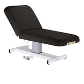 Everest electric lift spa table single pedestal Electric spa table with rounded salon corners Pro-Plush 3 inch cushioned treatment table
Single column spa lift table in clinic
Everest spa table foot control detail