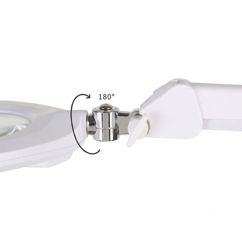 Silhouet-Tone C103 professional LED magnifying lamp; C103 magnifying lamp with articulated arm; 7-inch glass lens on Silhouet-Tone C103 lamp; LED ring surrounding the C103 magnifying lens; C103 table-clamp magnifying lamp for estheticians; Silhouet-Tone magnifying lamp positioned over a treatment table; Touch dimmer control on C103 LED magnifying lamp; Table clamp attachment for Silhouet-Tone C103 lamp.