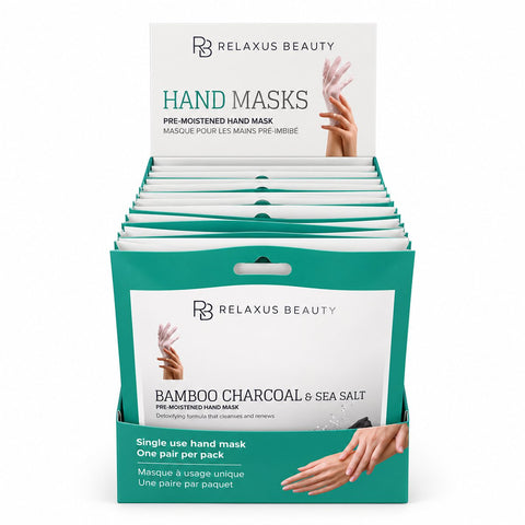 Bamboo charcoal and sea salt hand mask pouch; pre-moistened hand mask treatment; glove-style bamboo charcoal hand mask; sea salt hand mask for a 30-minute routine; hand mask removed from its pouch; bamboo charcoal hand-care mask packaging; hands wearing a pre-moistened glove-style mask; single-use charcoal and sea salt hand mask.