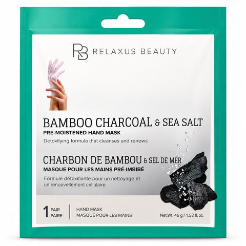 Bamboo charcoal and sea salt hand mask pouch; pre-moistened hand mask treatment; glove-style bamboo charcoal hand mask; sea salt hand mask for a 30-minute routine; hand mask removed from its pouch; bamboo charcoal hand-care mask packaging; hands wearing a pre-moistened glove-style mask; single-use charcoal and sea salt hand mask.