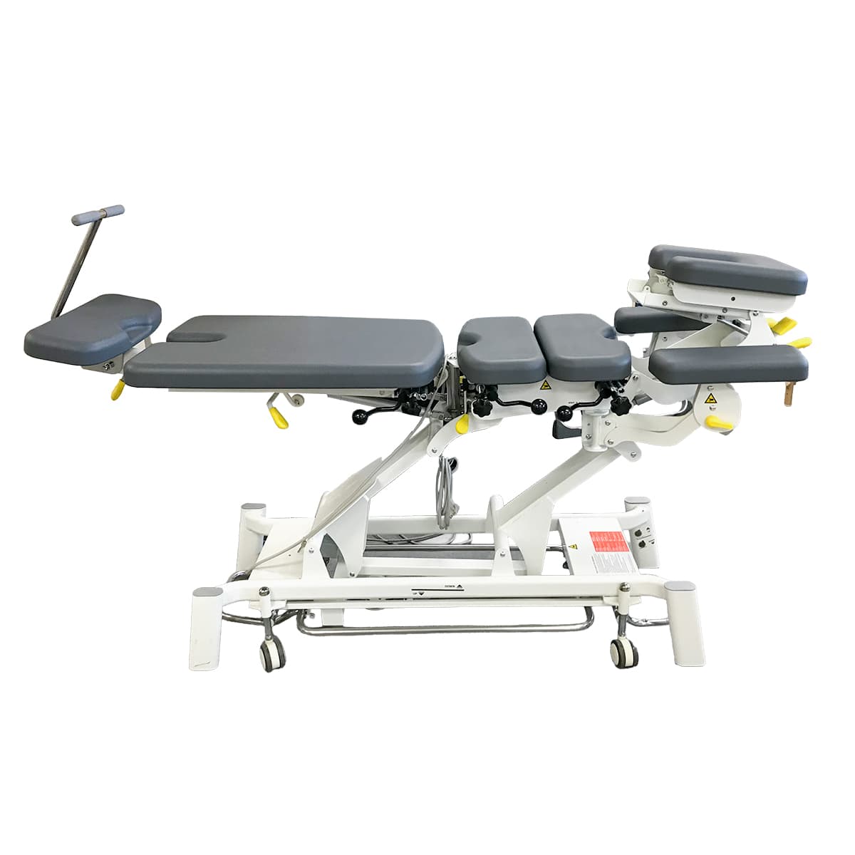 Chiropractic Table Electric chiropractic table with drop sections Chiropractic table with traction features FairWorth table with adjustable headrest Heavy-duty steel chiropractic treatment table