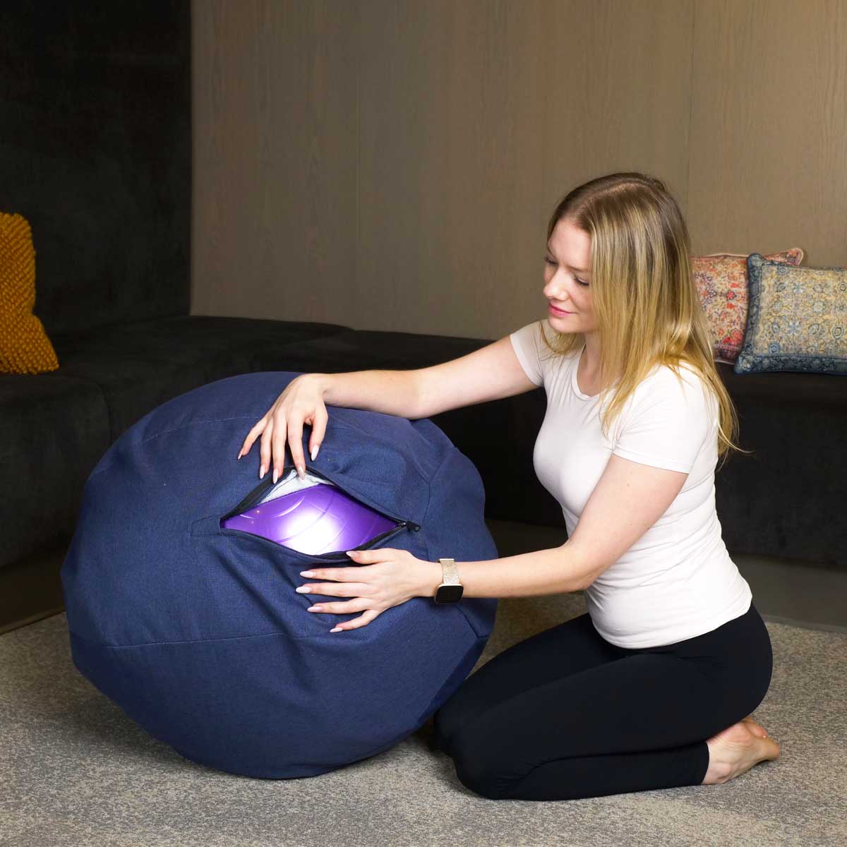 Yogi Ball with Fabric Cover with woman showcasing zipper